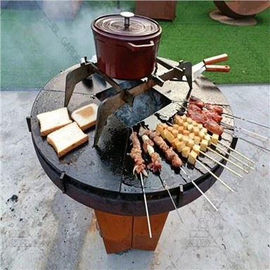 حفرة النار الخشبية مع صر الطبخ
